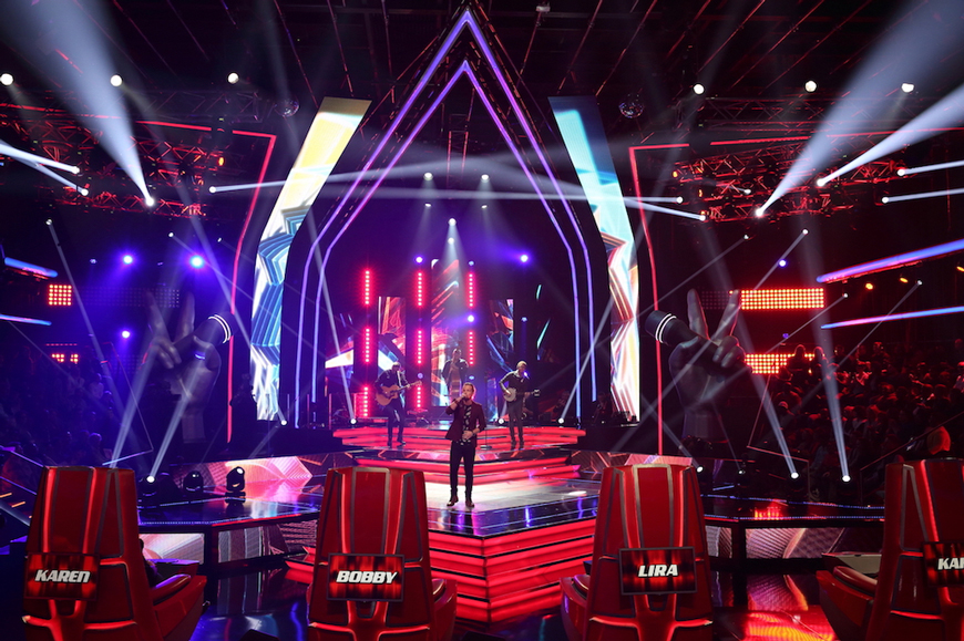 Purple and white illuminated frames surrounding The Voice South Africa stage.