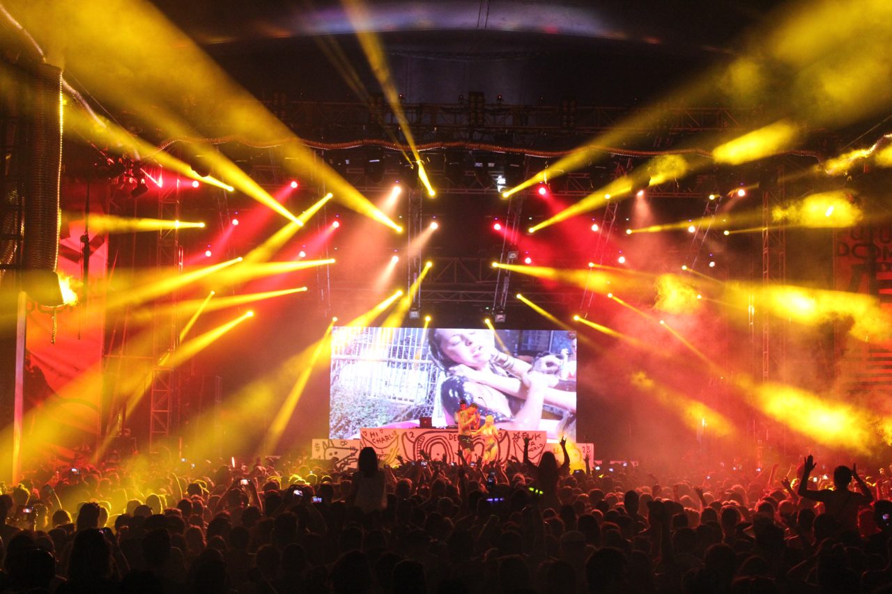 Yellow and red beams surround the stage screen at Future Music Festival.