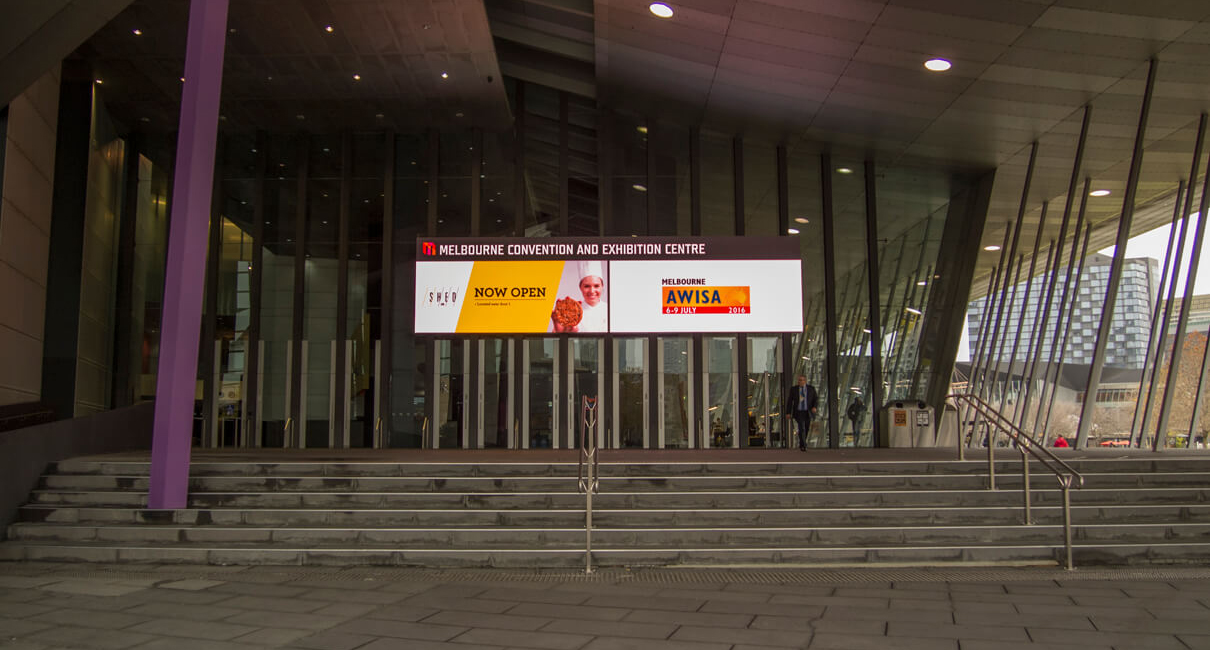 View up the entrance steps towards the event screen at MCEC.