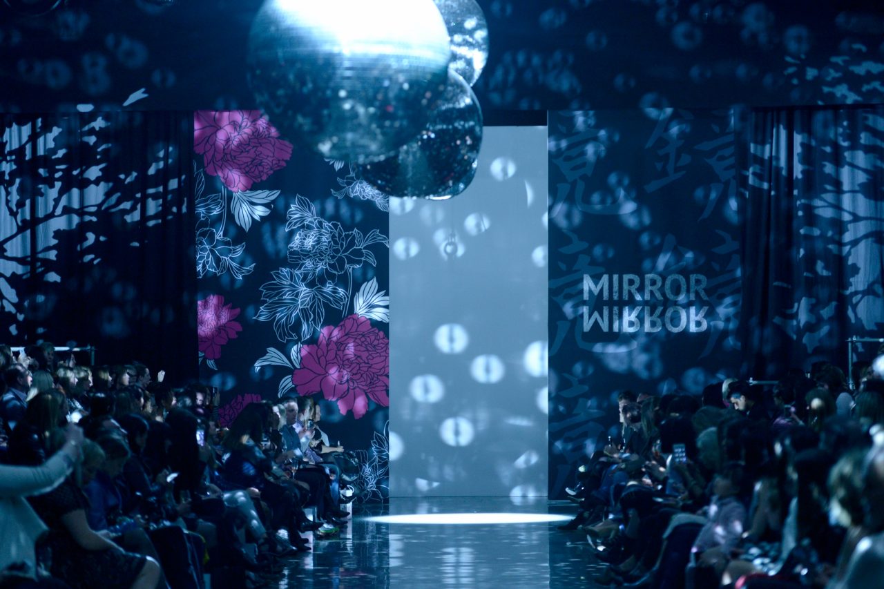 Patterned lighting across the runway entrance at New Zealand Fashion Week.