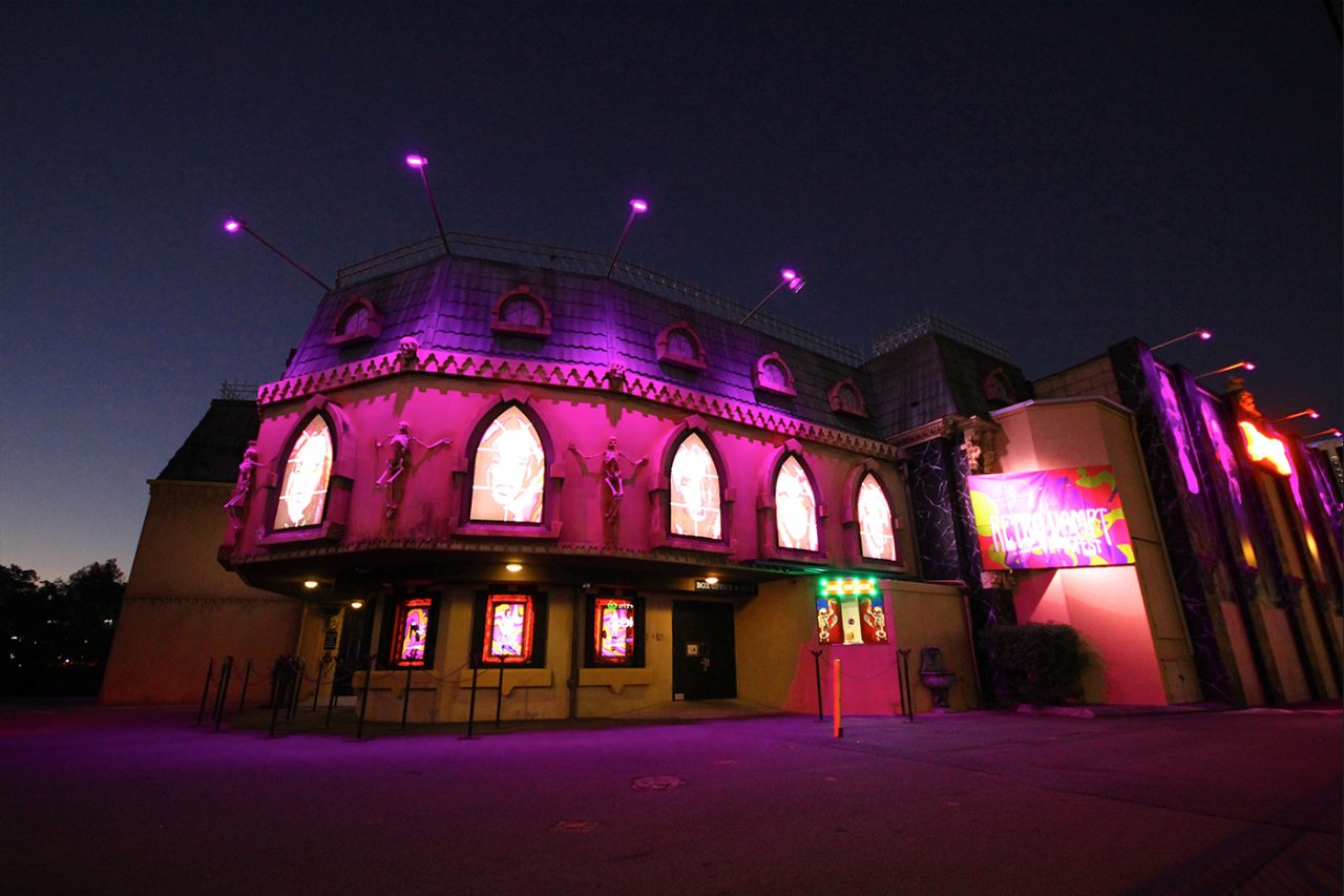 Pink lighting across the facade of Dracula's Cabaret Restaurant on the Gold Coast.
