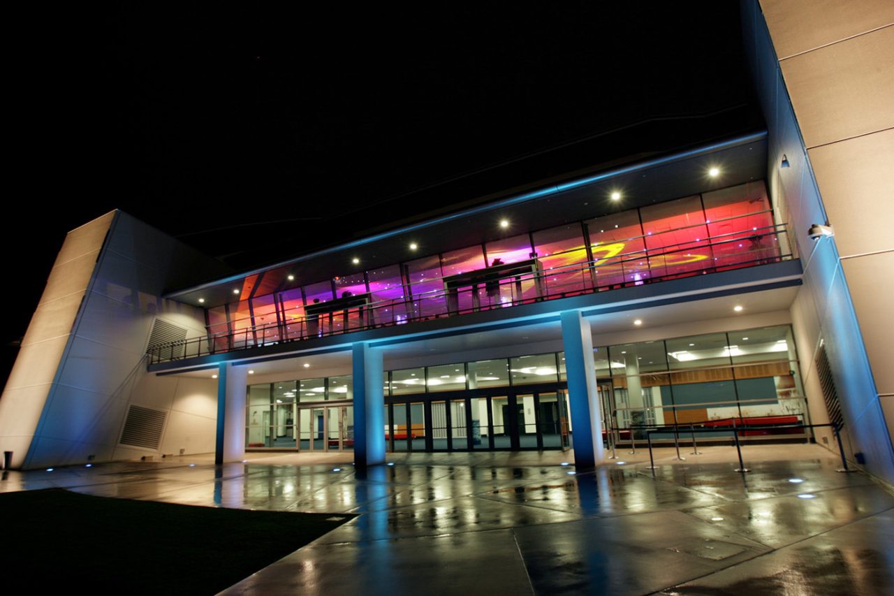 Red and purple lighting above the entrance to Gold Coast Convention and Exhibition Centre.