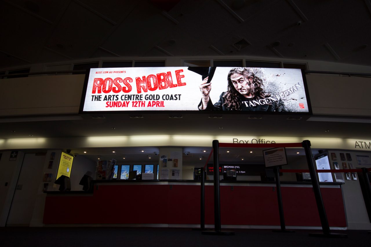 Ross Noble event advertising on the digital display above the HOTA box office.