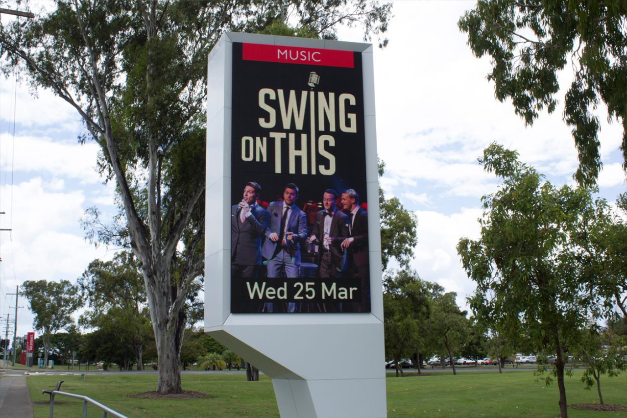 Swing On This event promotion on the roadside digital sign at HOTA.