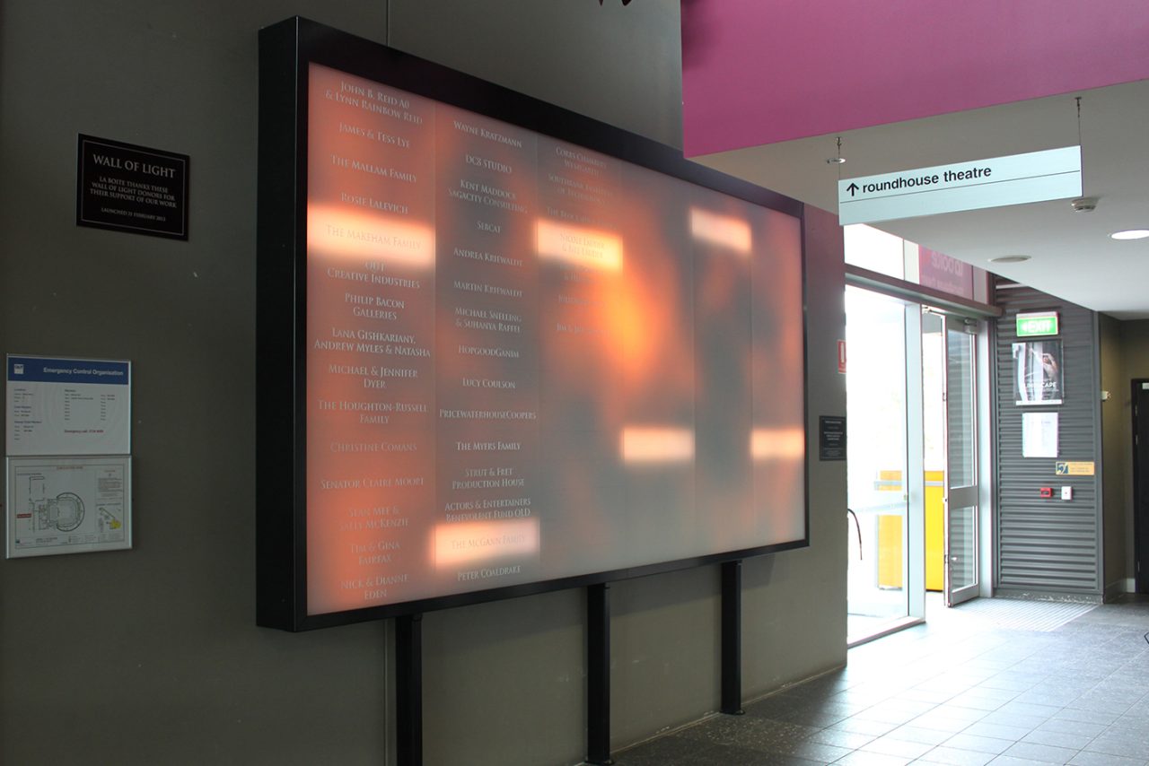 Warm-toned video imagery on La Boite Theatre's foyer screen.