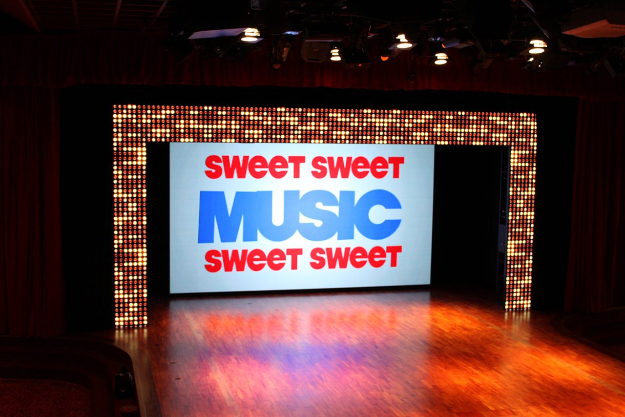 Sweet Sweet Music text on the Pacific Dawn theatre screen.