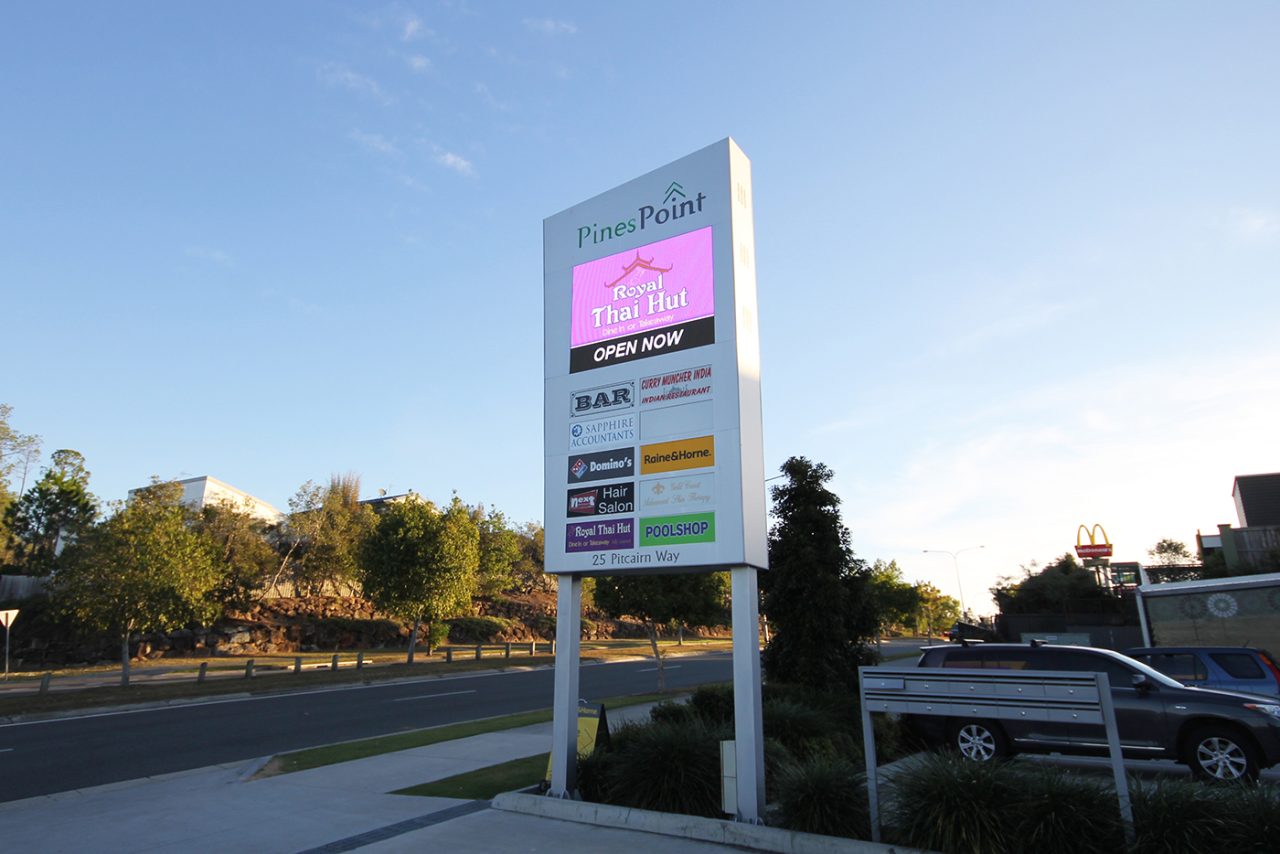 Pink advertising on the roadside Pines Point digital sign.