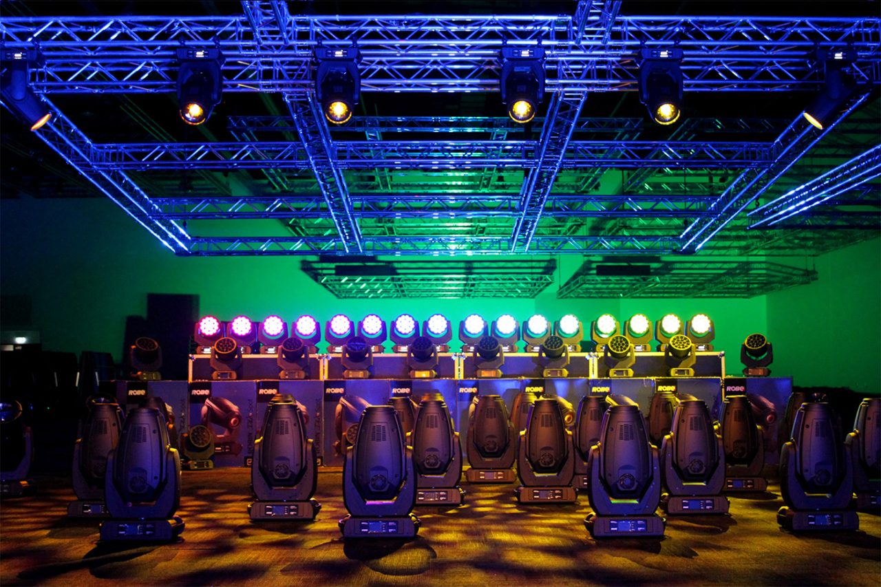 Rows of lighting fixtures displayed beneath the truss at Royal International Convention Centre.
