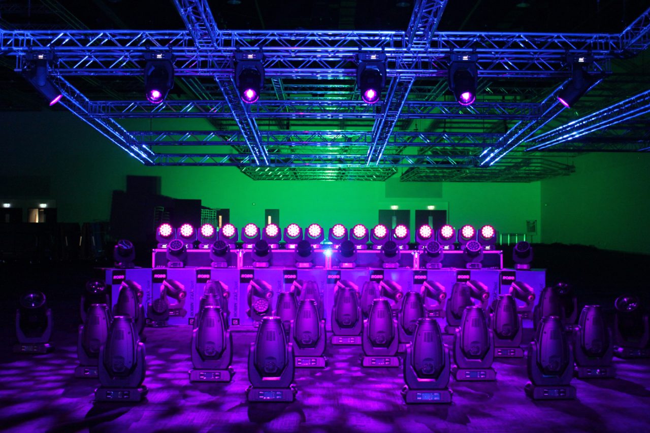 Purple light across rows of fixtures at Royal International Convention Centre.