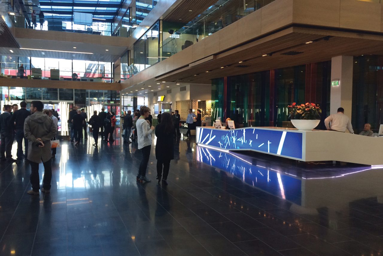 Digital display across the reception desk in the Spark headquarters foyer.