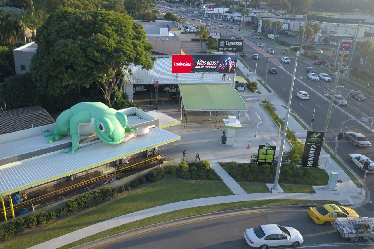 Aerial view of Hoppy's cafe, rooftop billboard and Ferry Road traffic.