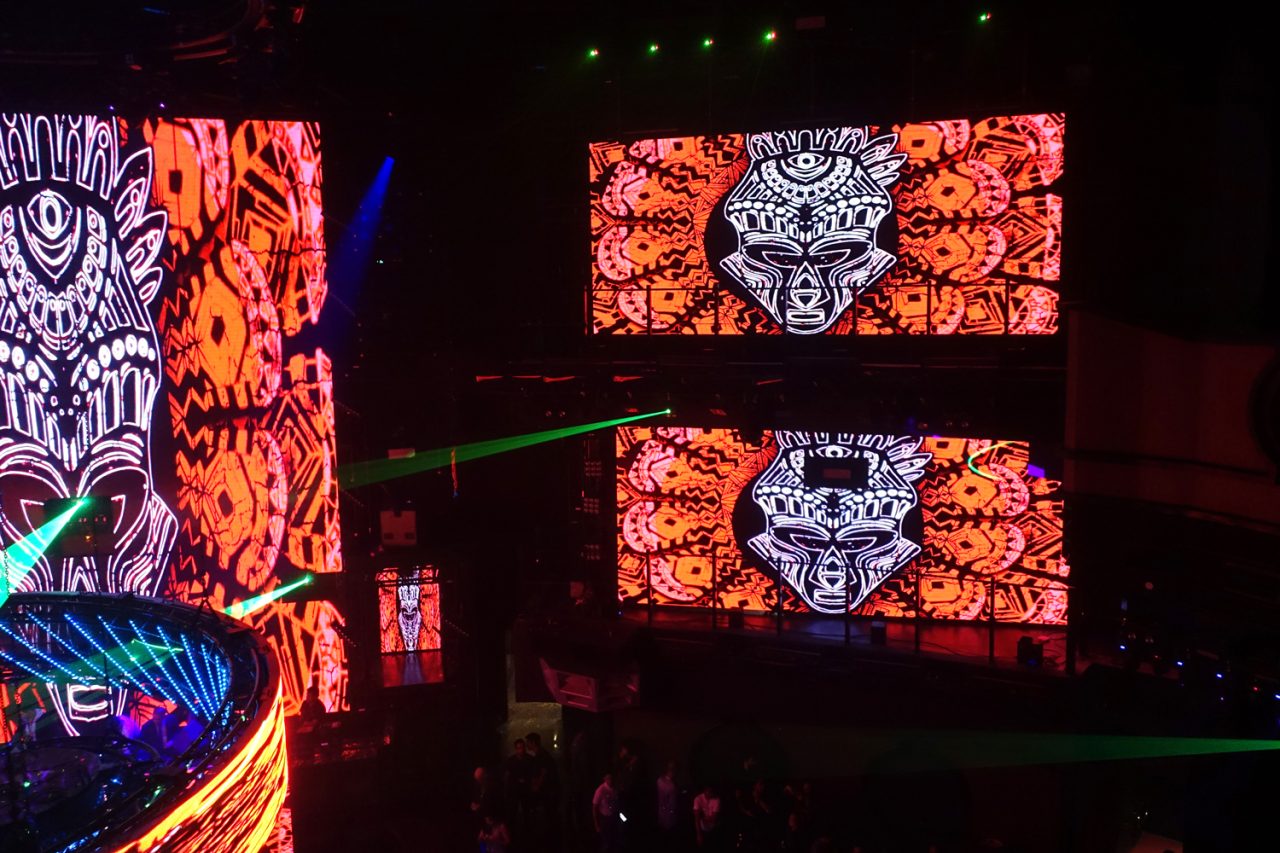 Orange and monochrome patterns across the Cove Manila video panels.
