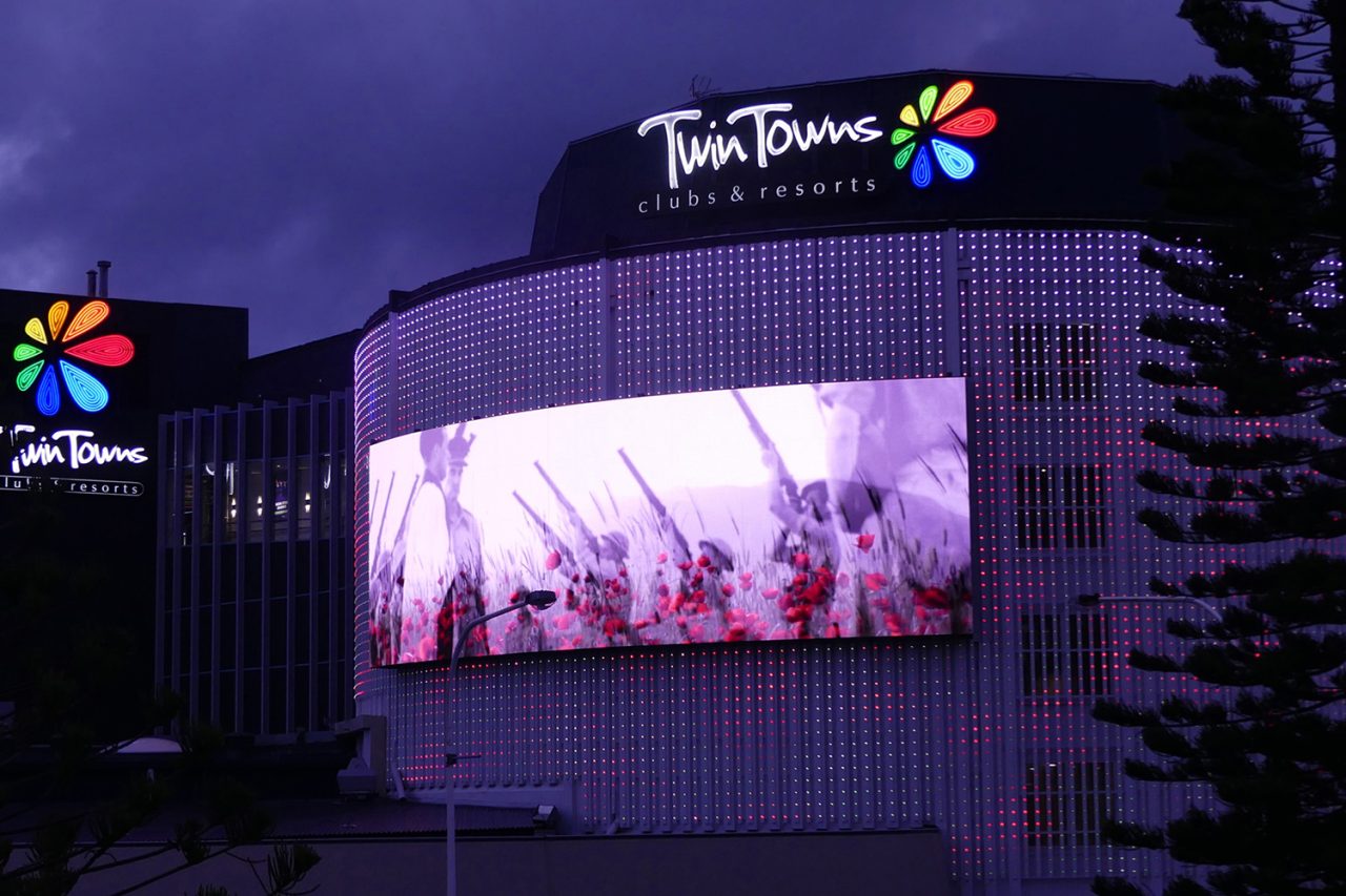 Close view of video imagery on the curved Twin Towns media facade.