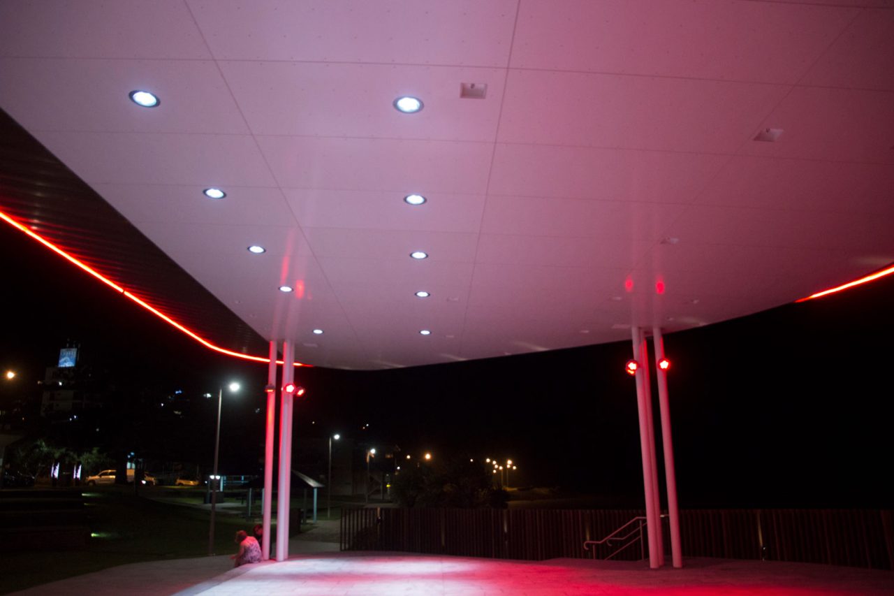 Red edge lighting around the underside of the Yeppoon amphitheatre canopy.