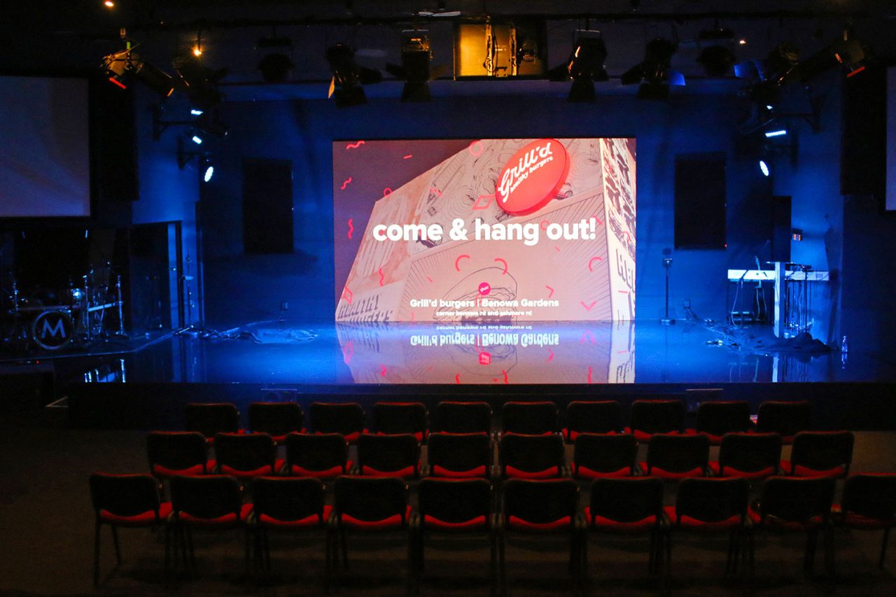 Event announcement on the large LED screen at Metro Church.