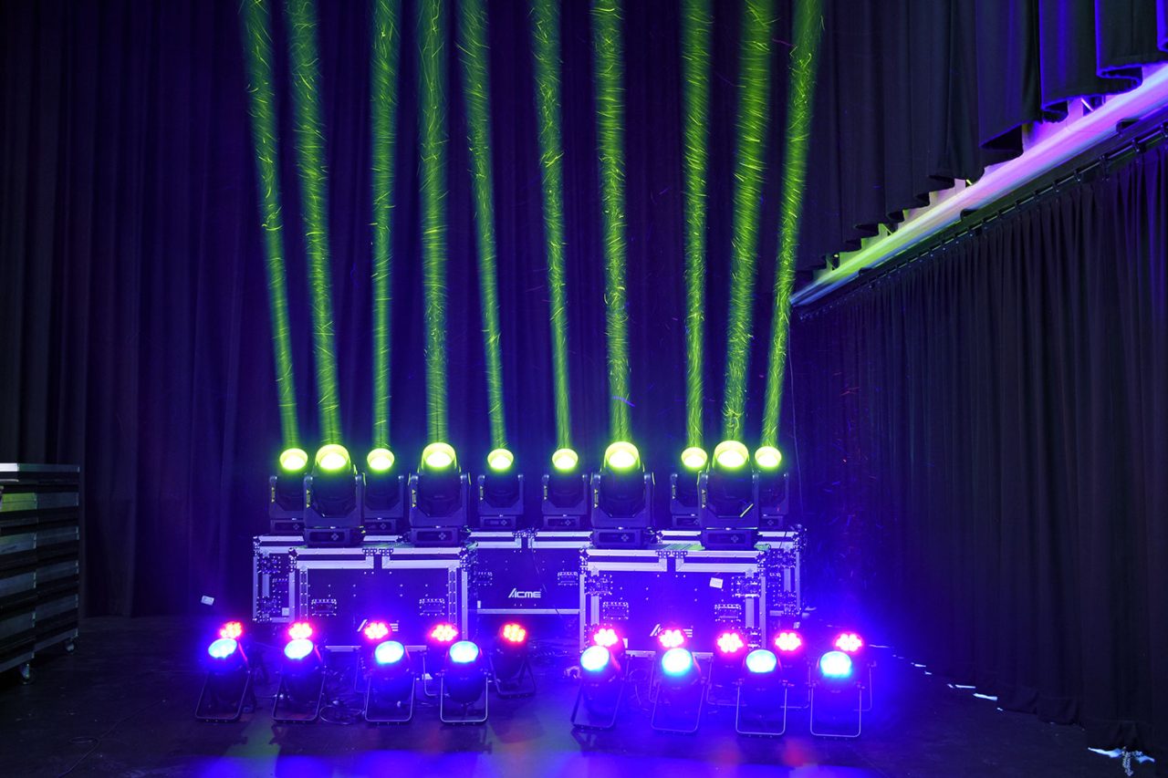 Narrow green beams and purple uplighting from the lighting inventory at Townsville Civic Theatre.