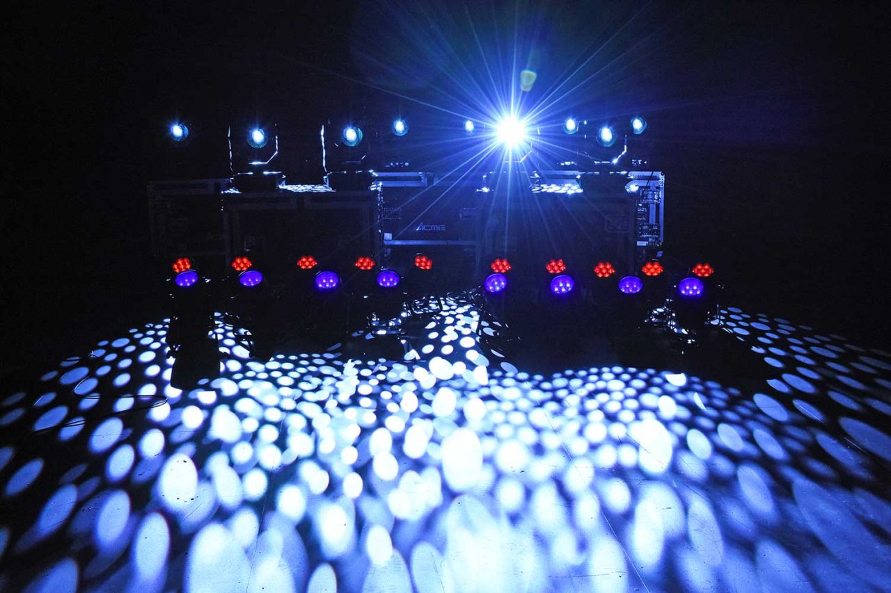 White patterned light across the floor beneath fixtures at Townsville Civic Theatre.