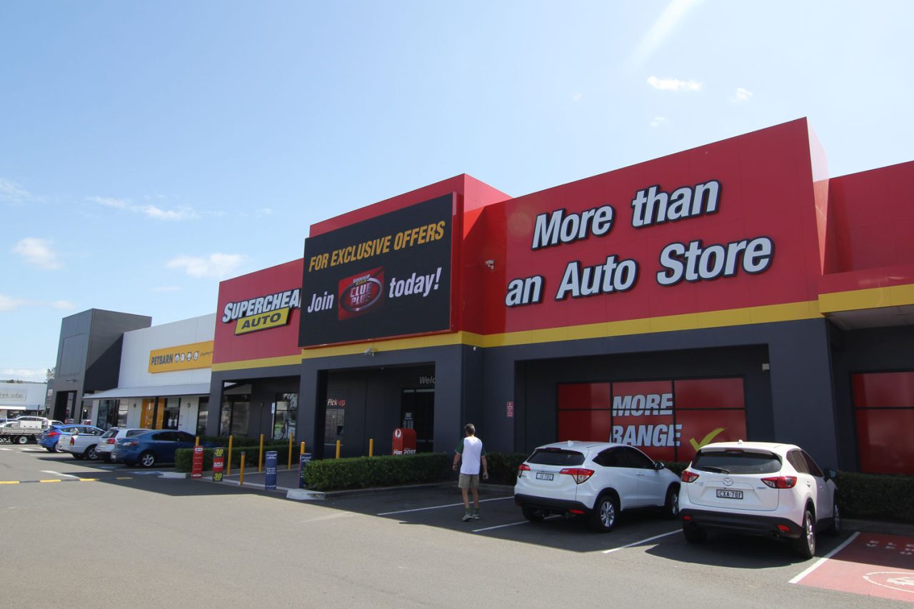 Angled view of the Supercheap Auto Penrith storefront and digital advertising screen.