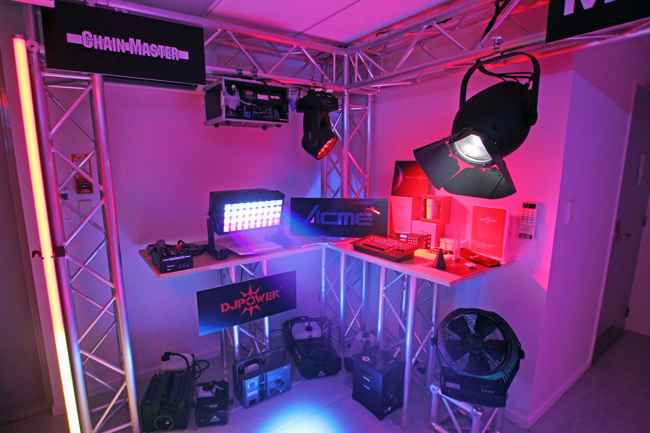 Lighting and effects products on truss shelves at the Auckland facility opening.