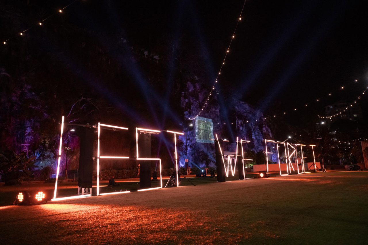 Close view of illuminated Lest We Forget letters on the lawn at Howard Smith Wharves.