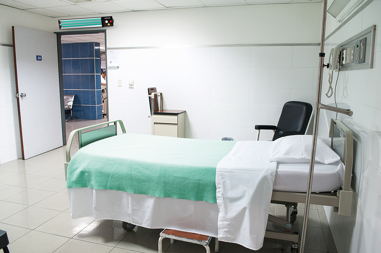 Luxibel unit mounted on the wall of a treatment room.