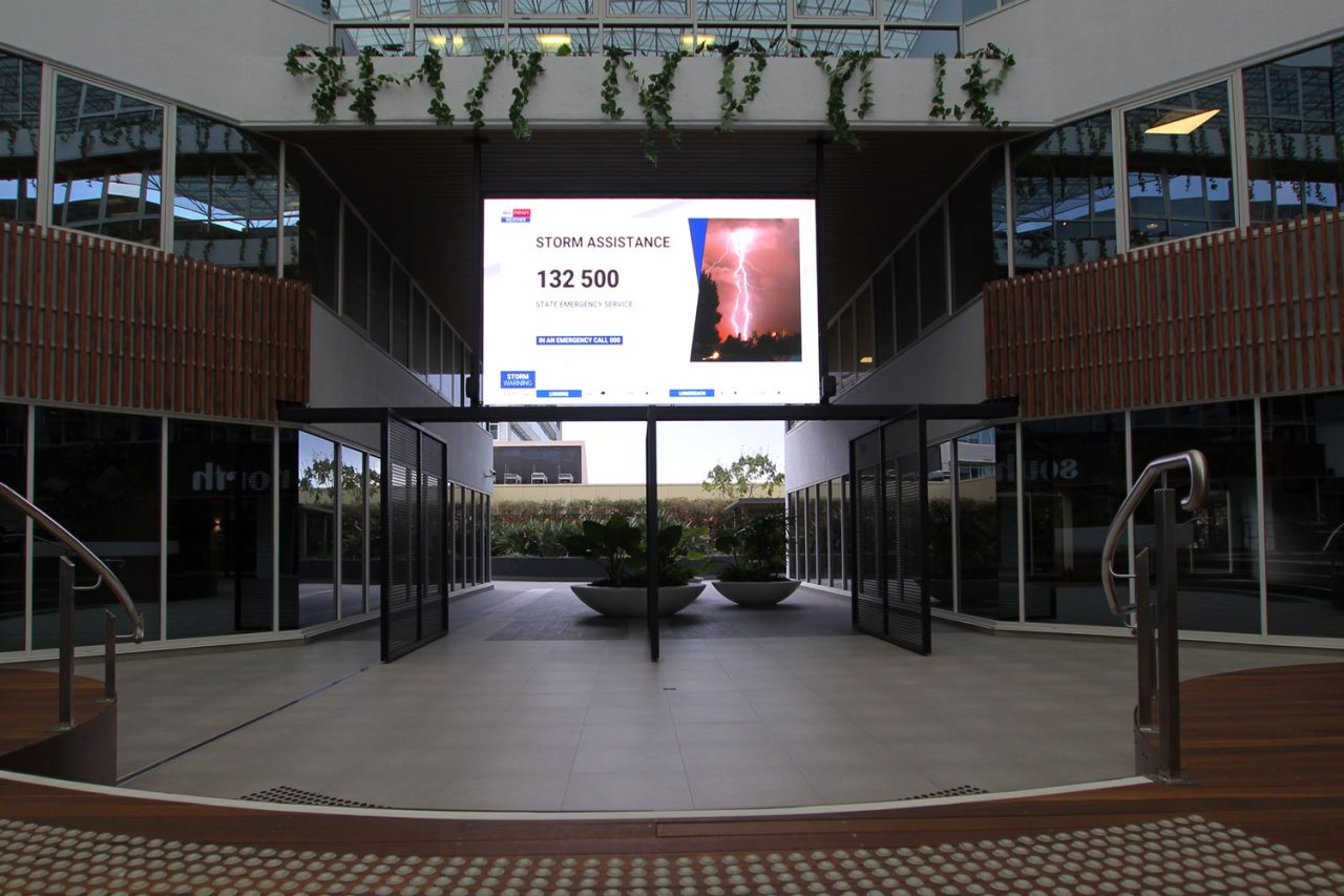 LED screen above the central walkway at 339 Coronation Drive, Milton.