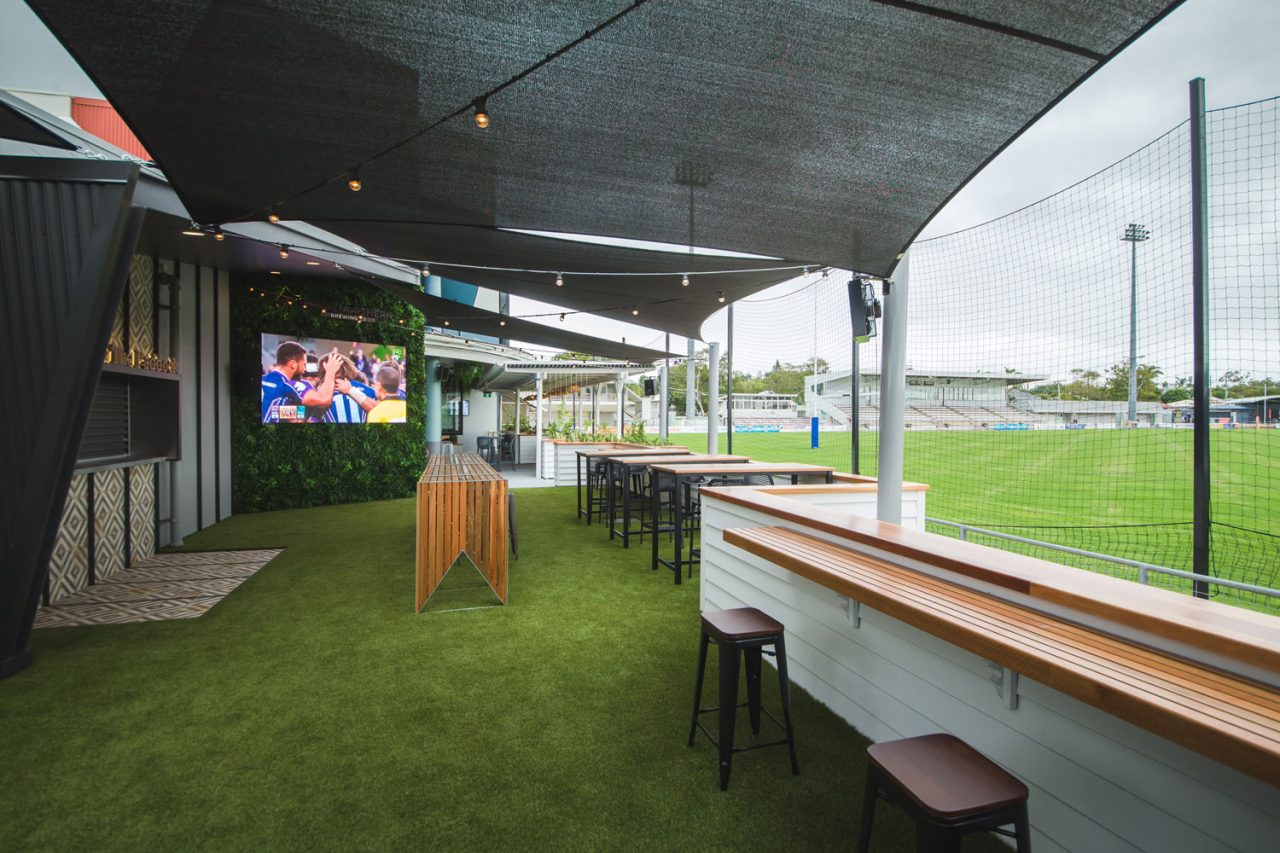 Large screen and seating in the covered alfresco area at Rockhampton Leagues Club.
