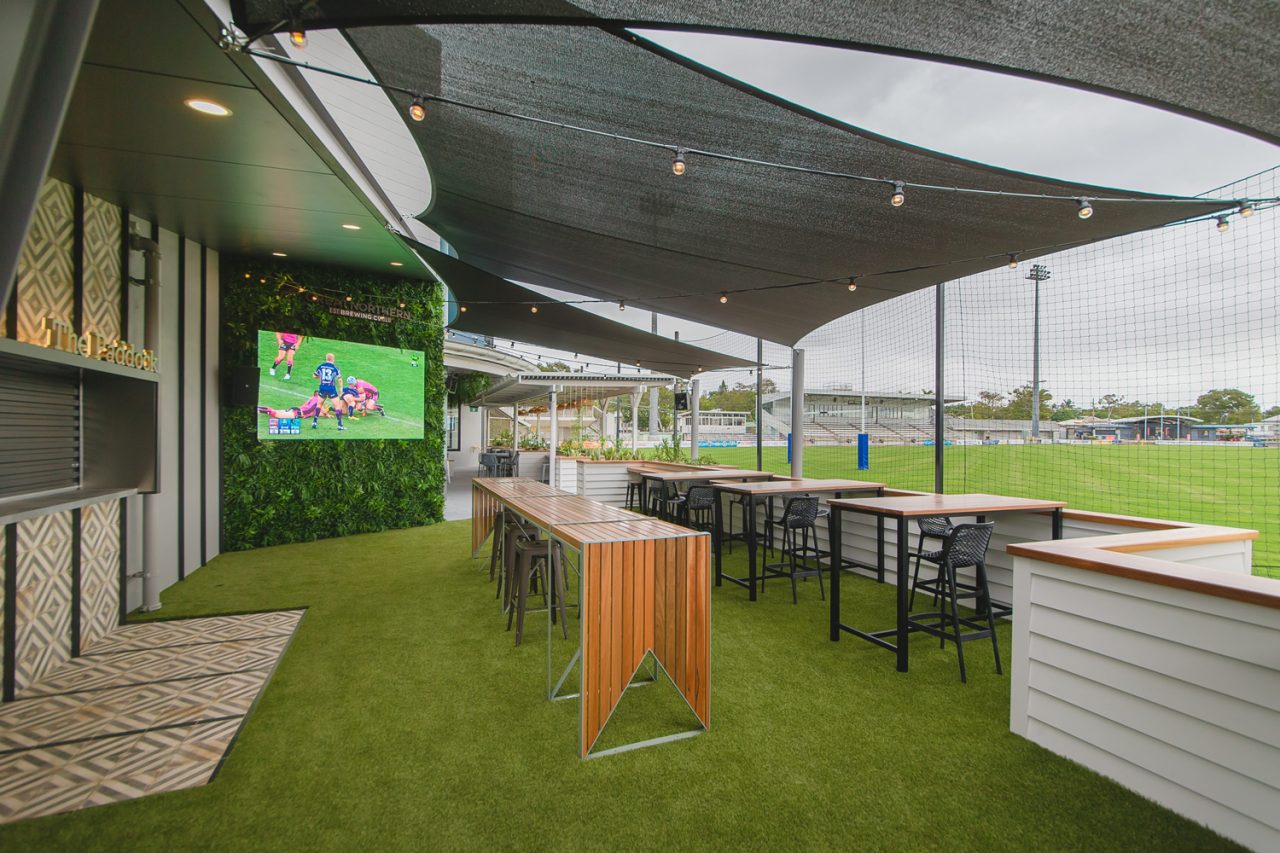 Covered terrace seating and a large sports screen at Rockhampton Leagues Club.