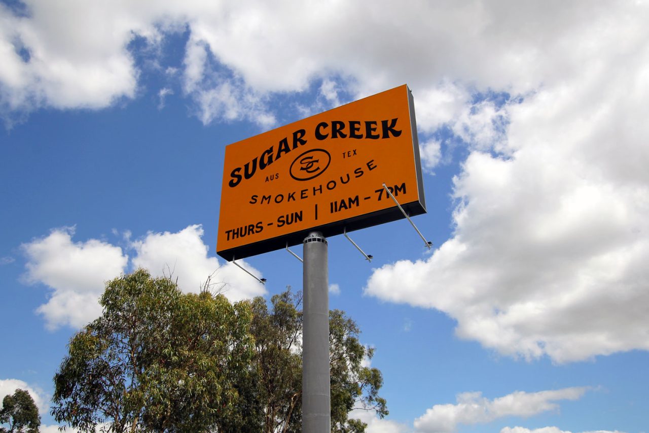 Digital billboard at Zarraffa’s Eagleby headquarters showing a Sugar Creek promotion.