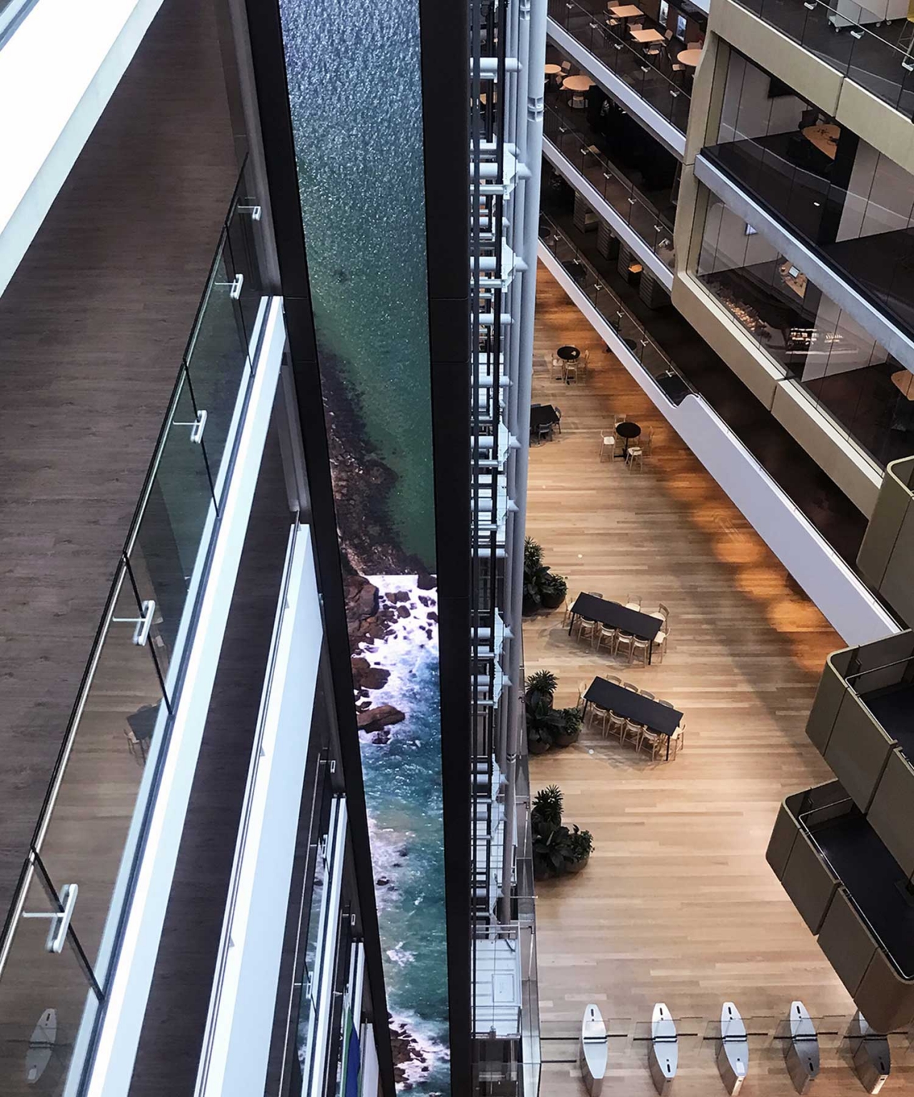 High-angle view showing the height of the digital column beside the lift shaft.