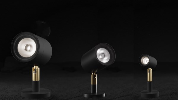 Three Griven Moon landscape lighting fixtures in different sizes.