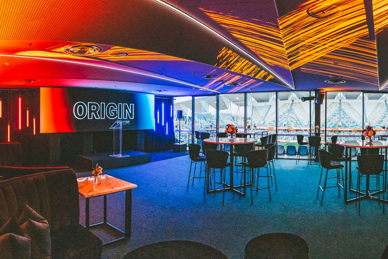 Red and blue tube lighting across a venue supplied by Audio Visual Events.