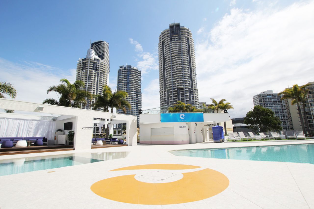 Cali Beach pool and terrace beneath the Gold Coast skyline.