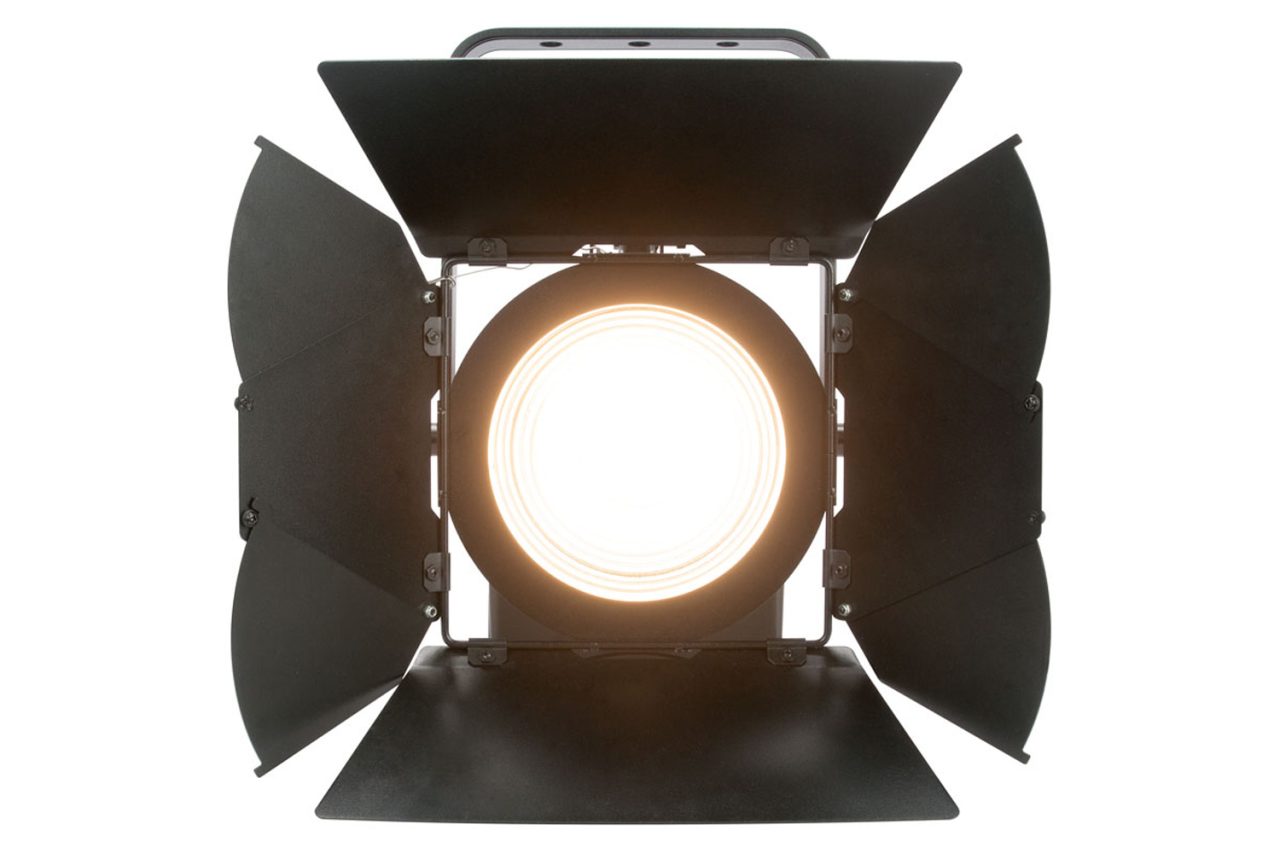 Front view of an illuminated Elation KL Fresnel 6 FC with barn doors.