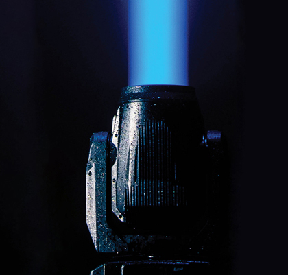 Proteus Excalibur projecting a narrow blue beam against a dark background.
