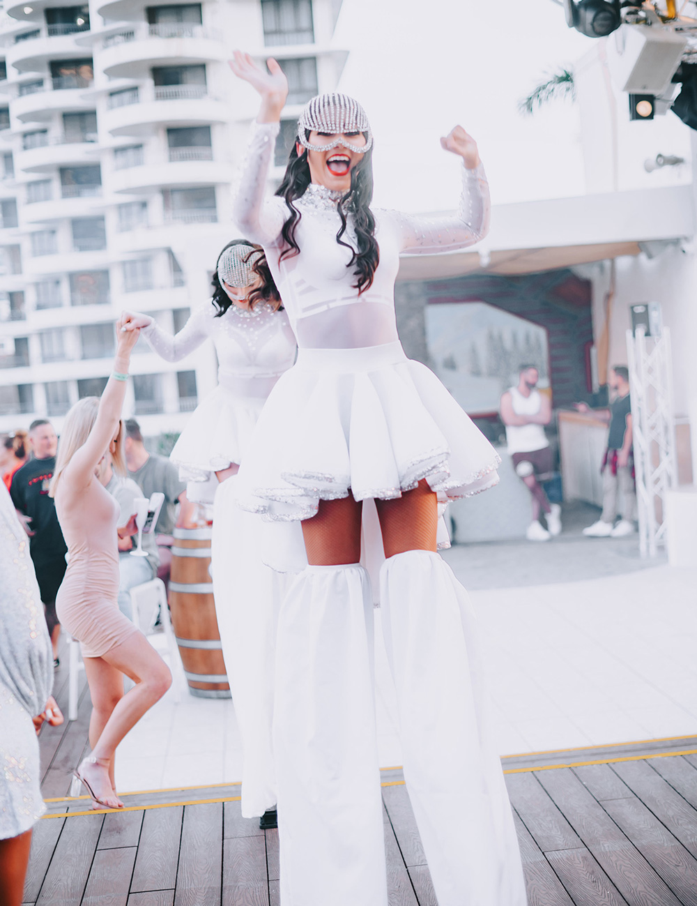 Costumed performers at the Cali Beach first birthday celebration.