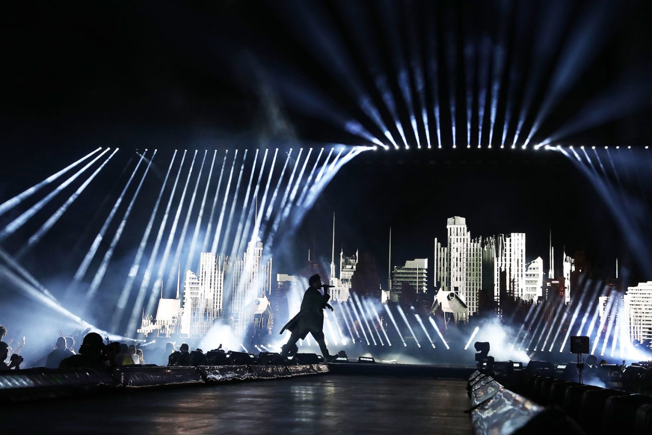 White beams above a city-like stage set on The Weeknd's After Hours til Dawn tour.