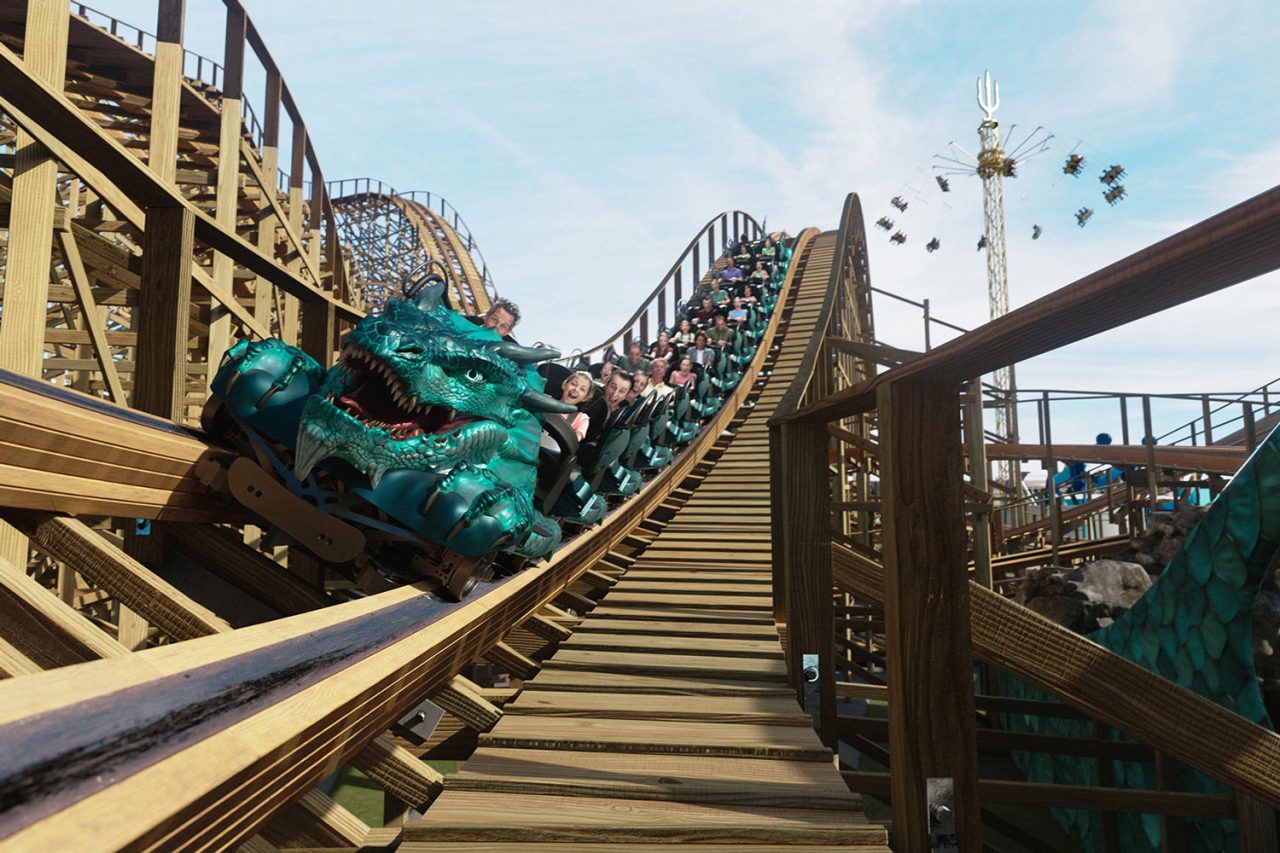 A Leviathan rollercoaster train travelling along the wooden track at Sea World.