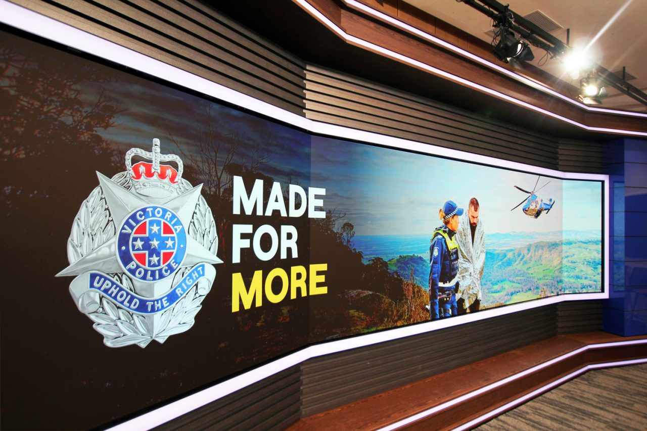 Made For More campaign imagery across the Victoria Police media centre video wall.