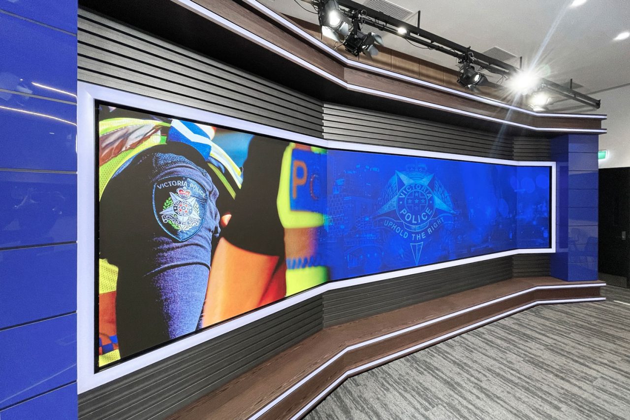 Angled view of the large video wall in the Victoria Police media centre.