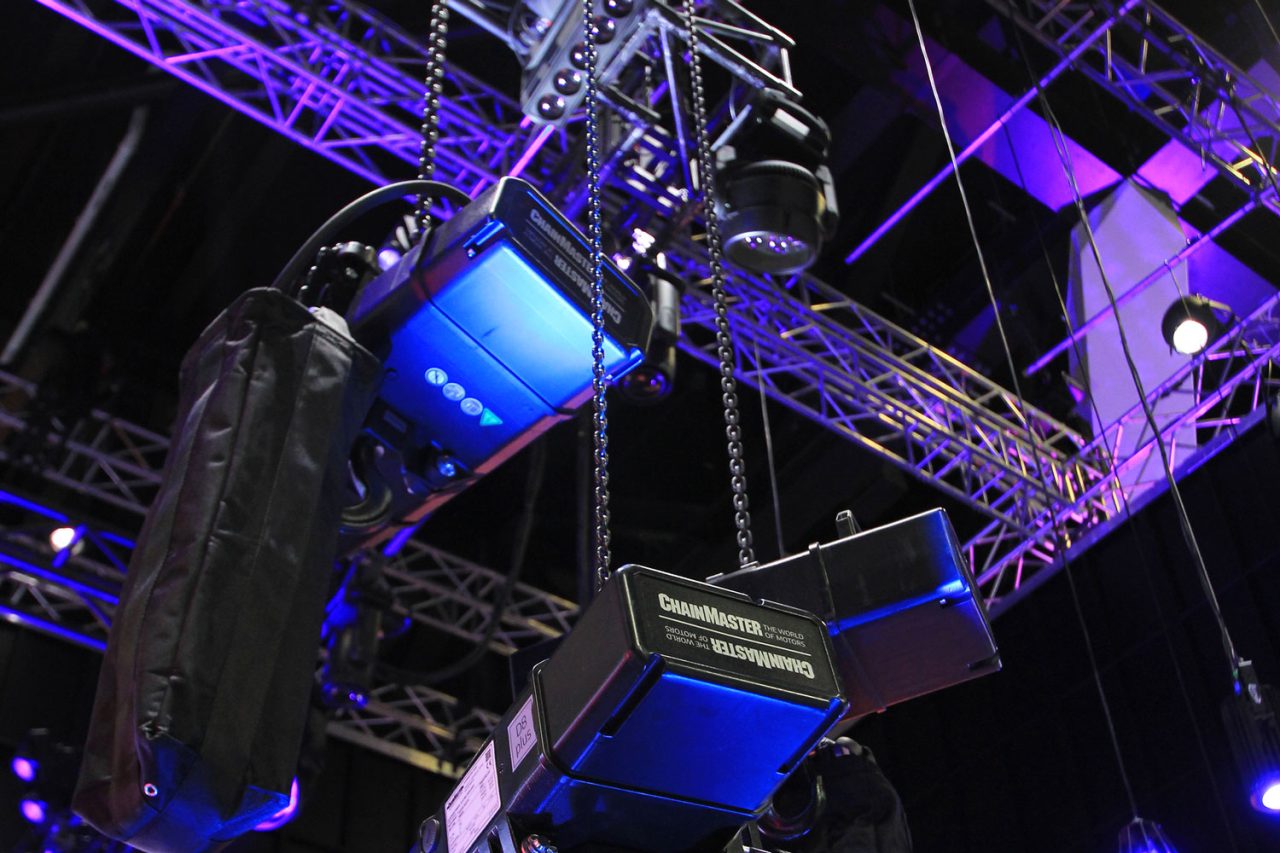 Overhead rigging and suspended equipment at ULA's Integrate stand.