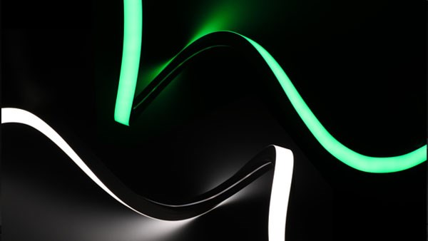 Green and white Griven Krait flexible LED strips arranged in curves.