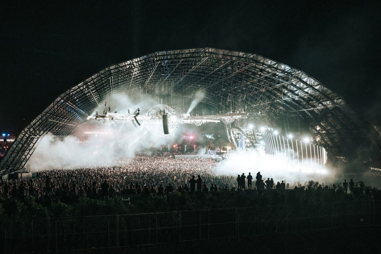 White beams and haze filling the arched Sahara Tent at Coachella 2024.