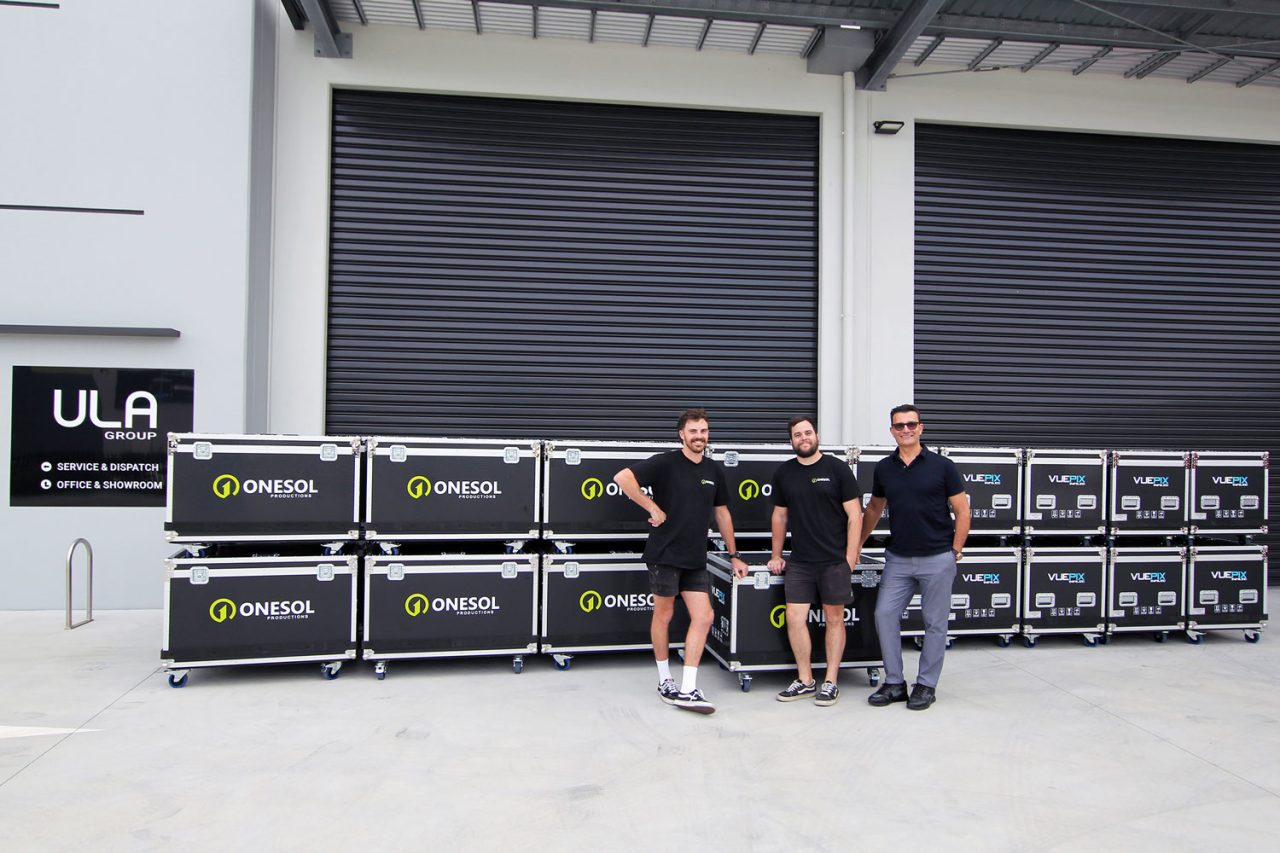 Onesol and ULA team members beside newly delivered VuePix LED screen flight cases.