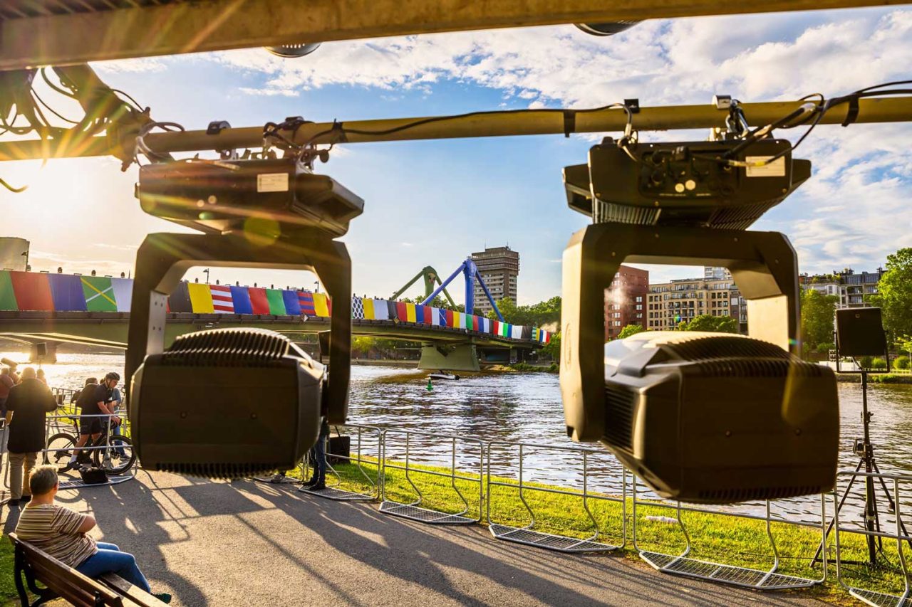 Moving-head fixtures rigged beside the river for Frankfurt's UEFA EURO 2024 light show.