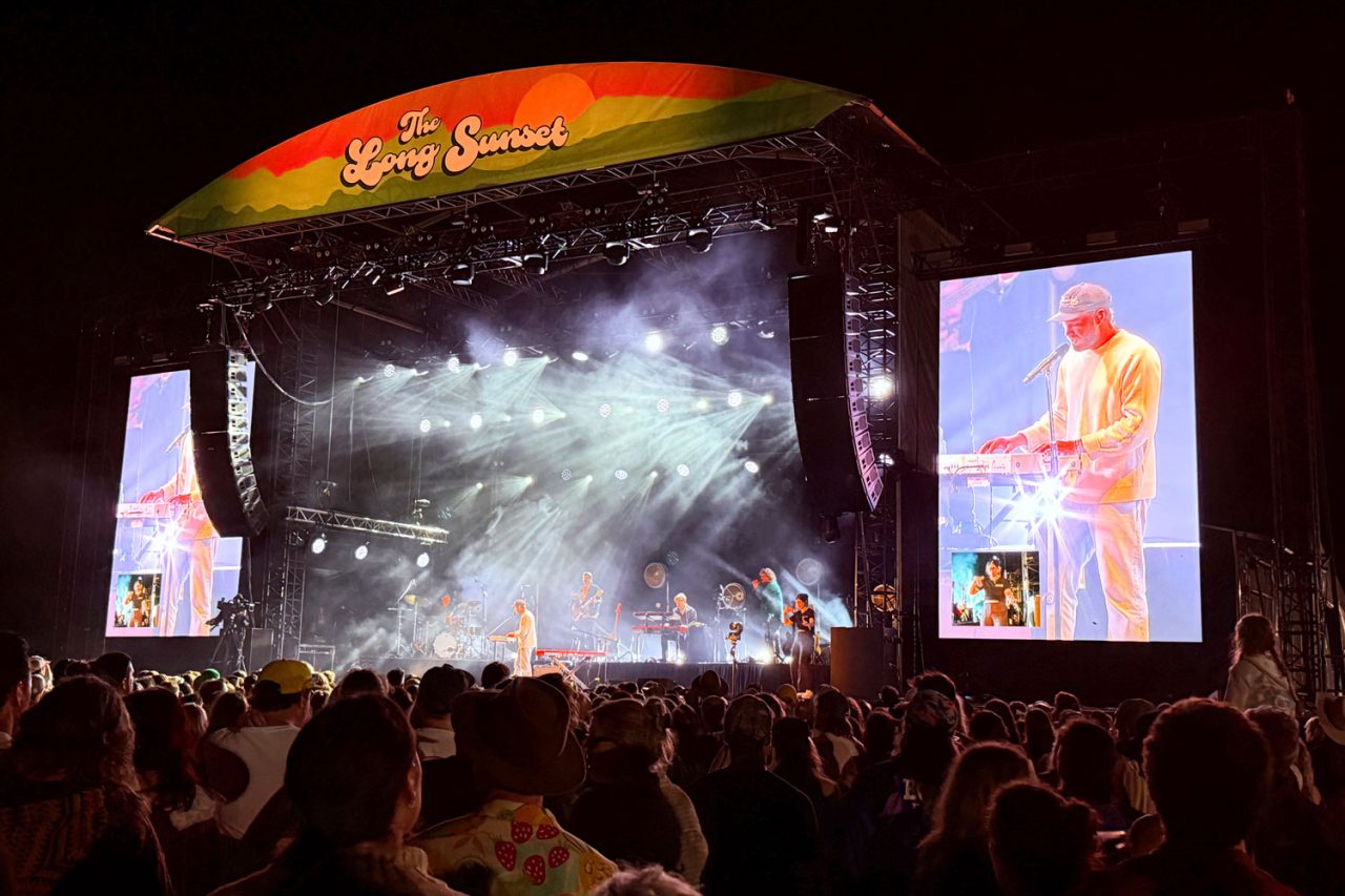 White beams and large live video screens at The Long Sunset festival.