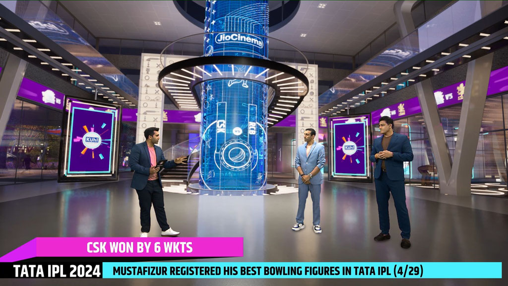 Cricket presenters in a virtual studio with a large augmented trophy display.