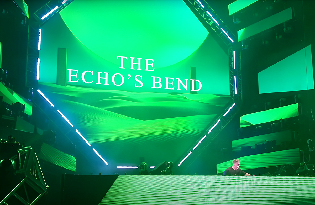 Green stage screens displaying The Echo's Bend at Ultra Miami.