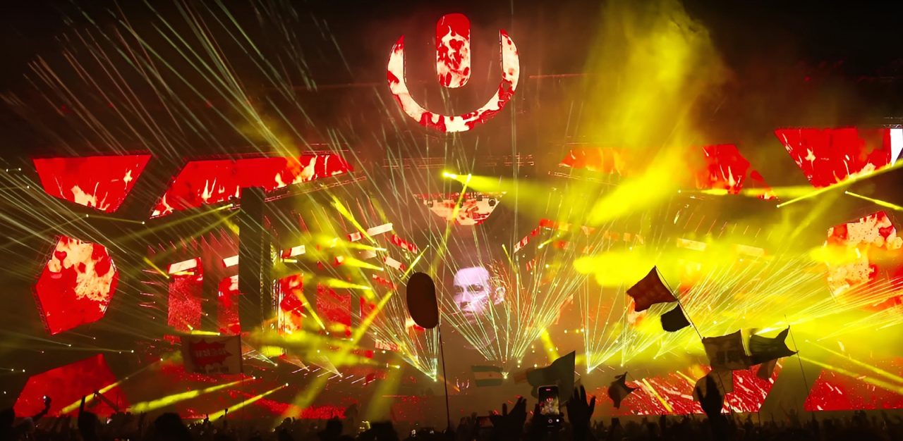 Ultra Miami main stage filled with red graphics and yellow beams.