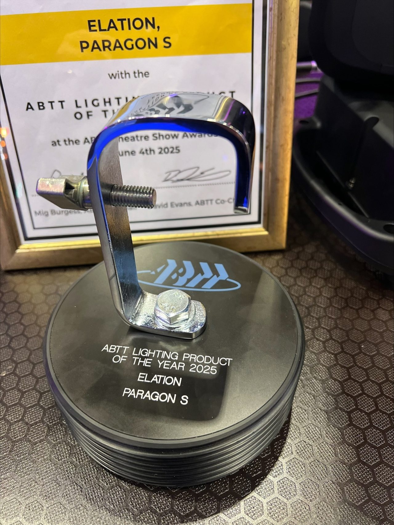 ABTT Lighting Product of the Year trophy beside the Elation Paragon S certificate.